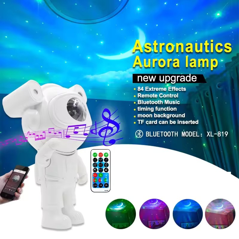 Proiector LED  in forma de astronaut cu sunete si lumini, stickere autoadezive, conexiune Bluetooth